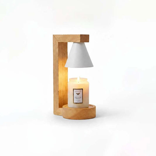 Wooden Candle Warmer Lamp on a wooden base with lit candle under grey shade.