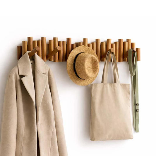 Wooden Wall Coat Rack with Flip Hooks mounted in an entryway; beveled pine dowels hold coats and bags. (10576922083661)